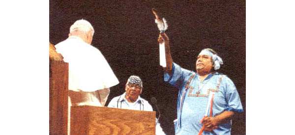 An Indian shaman blessing John Paul II